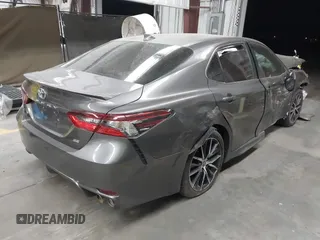 2022 Toyota Camry SE with VIN 4T1T11AK3NU717312, listed as a IAAI auction lot 41721896 with 29,923 mi miles. Bid and sale history available at carsss.com. Image 4.