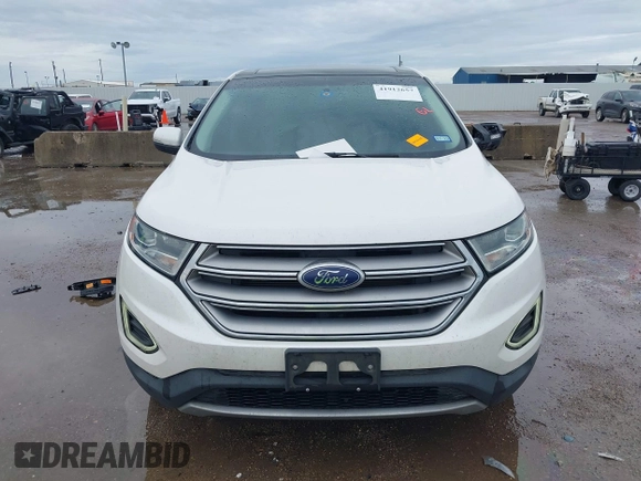 2015 Ford Edge Titanium z VIN 2FMTK3K82FBC42299, wystawiony jako IAAI lot #41912657 z przebiegiem 198 144 mil mil oraz . Historia ofert i sprzedaży dostępna na DreamBid. Obrazek 12.