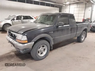 2000 Ford Ranger XLT with VIN 1FTZR15X2YPB86720, listed as a IAAI auction lot 41501141 with 211,794 mi miles. Bid and sale history available at carsss.com. Image 2.