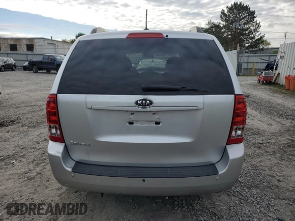 2012 Kia Sedona LX with VIN KNDMG4C79C6496785, listed as a Copart auction lot 73310344 with 130,243 mi miles and Salvage Title. Bid and sale history available at carsss.com. Image 6.