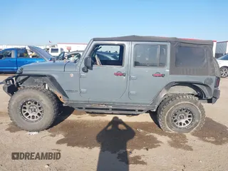 2015 Jeep Wrangler Unlimited Sport с VIN 1C4BJWDG6FL774275, выставлен на аукционе IAAI как лот 41984611 с пробегом 113 726 миль миль и . История ставок и продаж доступна на DreamBid. Изображение 14.