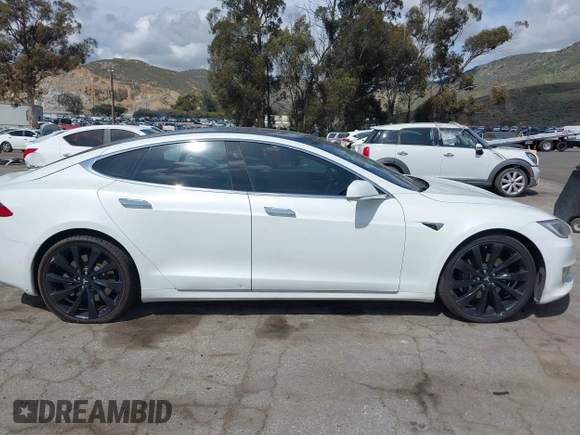 2018 Tesla Model S 75D with VIN 5YJSA1E22JF246928, listed as a IAAI auction lot 41869364 with 100,067 mi miles and . Bid and sale history available at DreamBid. Image 13.
