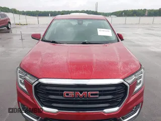 2023 GMC Terrain SLE z VIN 3GKALMEG7PL217846, wystawiony jako IAAI lot #42303391 z przebiegiem 14 149 mil mil oraz . Historia ofert i sprzedaży dostępna na DreamBid. Obrazek 6.