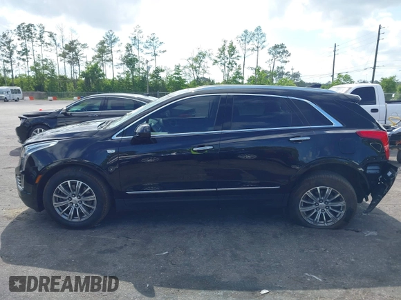 2017 Cadillac XT5 Luxury FWD z VIN 1GYKNBRS0HZ116875, wystawiony jako IAAI lot #42155840 z przebiegiem 47 625 mil mil oraz . Historia ofert i sprzedaży dostępna na DreamBid. Obrazek 14.
