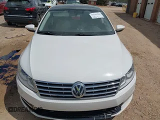 2014 Volkswagen CC Executive z VIN WVWGU7ANXEE507486, wystawiony jako IAAI lot #41943516 z przebiegiem 148 796 mil mil oraz . Historia ofert i sprzedaży dostępna na DreamBid. Obrazek 12.