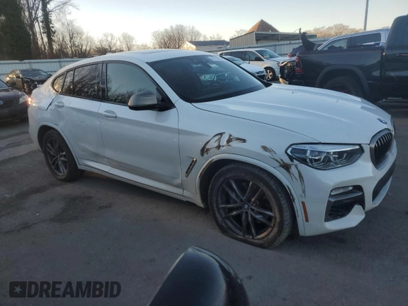 2019 BMW X4 M40i with VIN 5UXUJ5C55KLJ64105, listed as a Copart auction lot 87162014 with 92,946 mi miles and Salvage title. Bid and sale history available at DreamBid. Image 4.