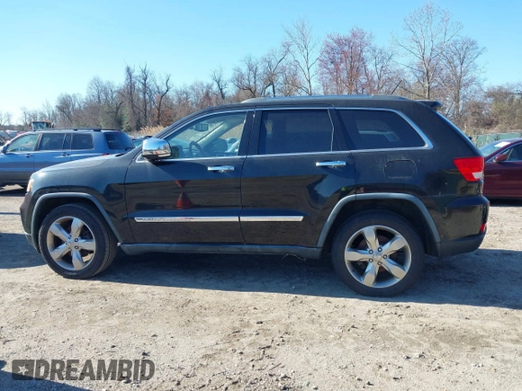 2011 Jeep Grand Cherokee Overland with VIN 1J4RS6GGXBC659349, listed as a IAAI auction lot 41778399 with 219,624 mi miles and . Bid and sale history available at DreamBid. Image 14.