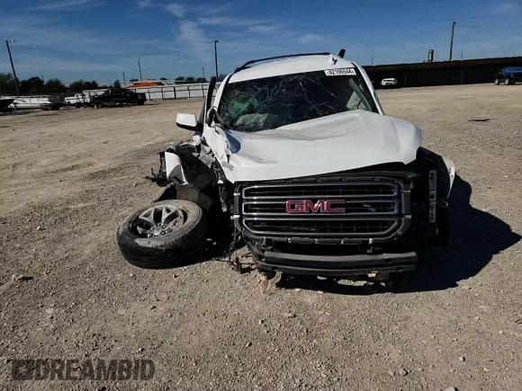 2015 GMC Yukon XL SLE z VIN 1GKS1GKC1FR643293, wystawiony jako Copart lot #82106544 z przebiegiem 164 623 mil mil oraz Szkoda całkowita • Salvage title. Historia ofert i sprzedaży dostępna na DreamBid. Obrazek 12.