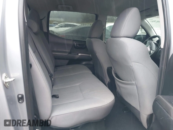 2018 Toyota Tacoma SR with VIN 3TMCZ5AN4JM148581, listed as a IAAI auction lot 41462945 with 115,655 mi miles. Bid and sale history available at carsss.com. Image 8.