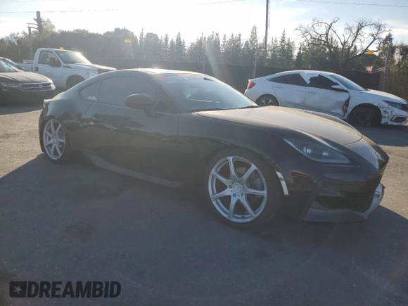 2023 Toyota 86 with VIN JF1ZNBC12P8765351, listed as a Copart auction lot 42859035 with 19,769 mi miles and Salvage Title. Bid and sale history available at DreamBid. Image 4.