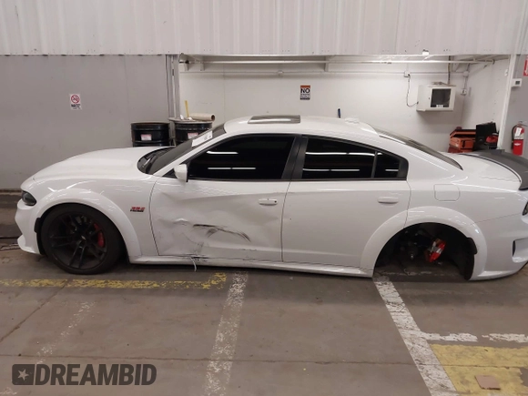 2021 Dodge Charger Scat Pack with VIN 2C3CDXGJ6MH563553, listed as a IAAI auction lot 41745898 with 39,844 mi miles and . Bid and sale history available at DreamBid. Image 14.