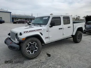 2020 Jeep Gladiator Rubicon z VIN 1C6JJTBG3LL156802, wystawiony jako Copart lot #48904865 z przebiegiem 30 704 mil mil oraz Szkoda całkowita • Salvage title. Historia ofert i sprzedaży dostępna na DreamBid. Obrazek 1.