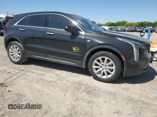 2023 Cadillac XT4 FWD Luxury z VIN 1GYAZAR46PF178003, wystawiony jako Copart lot #52024665 z przebiegiem 42 000 mil mil oraz Szkoda całkowita • Salvage title. Historia ofert i sprzedaży dostępna na DreamBid. Obrazek 4.
