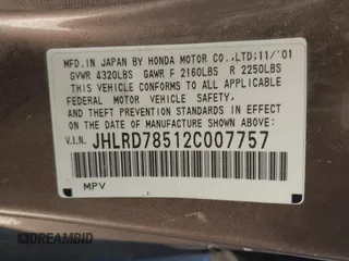 2002 Honda CR-V LX z VIN JHLRD78512C007757, wystawiony jako IAAI lot #41885302 z przebiegiem 177 892 mil mil oraz . Historia ofert i sprzedaży dostępna na DreamBid. Obrazek 9.