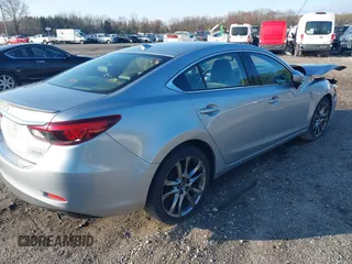 2017 Mazda 6 Grand Touring with VIN JM1GL1W50H1132261, listed as a IAAI auction lot 41930610 with 54,431 mi miles and . Bid and sale history available at DreamBid. Image 4.