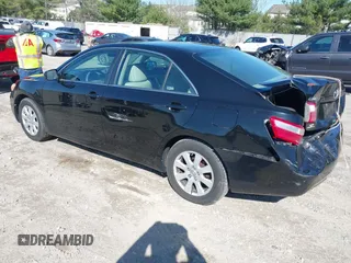 2009 Toyota Camry with VIN 4T1BE46K89U358717, listed as a IAAI auction lot 41995381 with 166,935 mi miles. Bid and sale history available at carsss.com. Image 3.