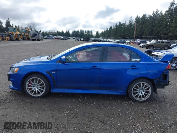 2015 Mitsubishi Lancer Evolution GSR with VIN JA32W8FV4FU012578, listed as a IAAI auction lot 41730742 with 64,762 mi miles. Bid and sale history available at carsss.com. Image 15.