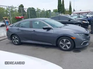 2020 Honda Civic LX z VIN 2HGFC2F60LH596396, wystawiony jako IAAI lot #42354812 z przebiegiem 62 082 mil mil oraz . Historia ofert i sprzedaży dostępna na DreamBid. Obrazek 13.