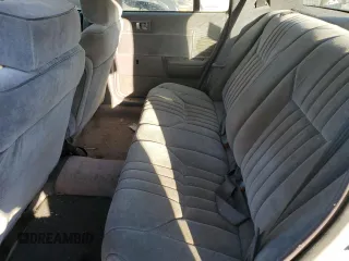 1991 Dodge Spirit z VIN 1B3XA5639MF549470, wystawiony jako Copart lot #76051284 z przebiegiem 62 309 mil mil oraz Szkody całkowita. Historia ofert i sprzedaży dostępna na DreamBid. Obrazek 10.