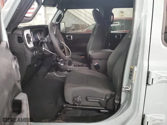 2024 Jeep Wrangler Sahara with VIN 1C4PJXEN1RW329776, listed as a Copart auction lot 85783094 with 1,182 mi miles and Salvage Title. Bid and sale history available at carsss.com. Image 7.