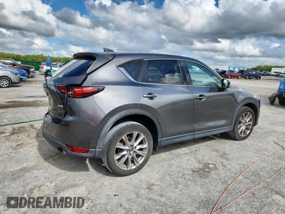 2019 Mazda CX-5 Grand Touring with VIN JM3KFADM2K1637664, listed as a Copart auction lot 63400975 with 45,663 mi miles and Salvage title. Bid and sale history available at DreamBid. Image 3.