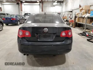 2006 Volkswagen Jetta 1.9L TDI z VIN 3VWST71KX6M711152, wystawiony jako Copart lot #57435505 z przebiegiem 209 511 mil mil oraz Nie do naprawy • Non repairable. Historia ofert i sprzedaży dostępna na DreamBid. Obrazek 6.