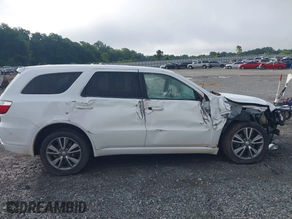 2013 Dodge Durango R/T with VIN 1C4SDHCT4DC648639, listed as a IAAI auction lot 42504044 with 193,909 mi miles and . Bid and sale history available at DreamBid. Image 13.