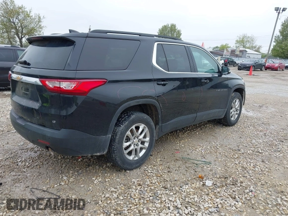 2021 Chevrolet Traverse LT with VIN 1GNERHKW0MJ218426, listed as a IAAI auction lot 42178273 with 76,545 mi miles and . Bid and sale history available at DreamBid. Image 4.