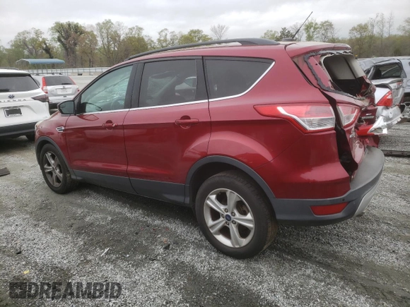 2014 Ford Escape SE with VIN 1FMCU0GXXEUD05991, listed as a Copart auction lot 51440465 with 129,445 mi miles and Salvage Title. Bid and sale history available at carsss.com. Image 2.