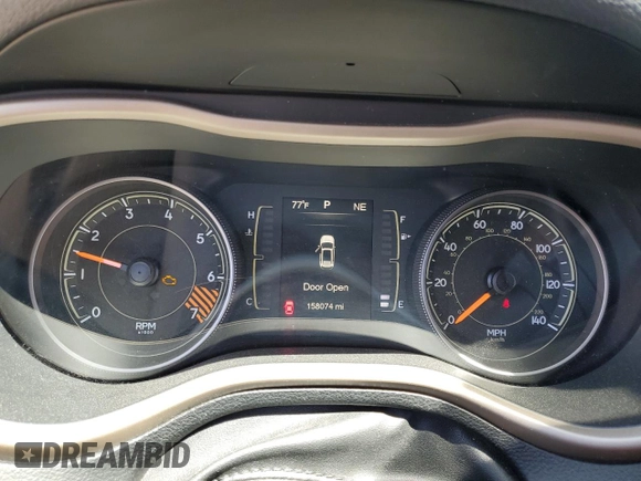 2015 Jeep Cherokee Sport with VIN 1C4PJMAB9FW545249, listed as a Copart auction lot 57528075 with 158,074 mi miles and Salvage title. Bid and sale history available at DreamBid. Image 9.