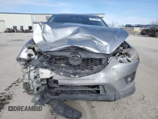 2015 Mazda CX-5 Touring with VIN JM3KE4CY4F0467571, listed as a Copart auction lot 88919035 with 197,755 mi miles and Salvage Title. Bid and sale history available at carsss.com. Image 5.
