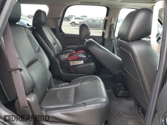 2014 Chevrolet Tahoe LTZ with VIN 1GNSKCE0XER228028, listed as a Copart auction lot 56971135 with 155,285 mi miles and Salvage title. Bid and sale history available at DreamBid. Image 10.