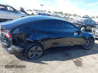 2022 Tesla Model 3 Long Range with VIN 5YJ3E1EB1NF313954, listed as a IAAI auction lot 41248187 with 31,247 mi miles and . Bid and sale history available at DreamBid. Image 12.