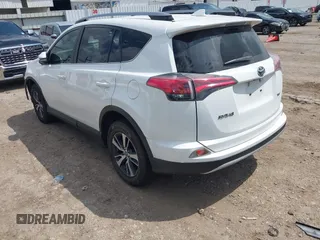 2017 Toyota RAV4 XLE with VIN JTMWFREV8HJ118885, listed as a IAAI auction lot 42097180 with 122,481 mi miles. Bid and sale history available at carsss.com. Image 3.