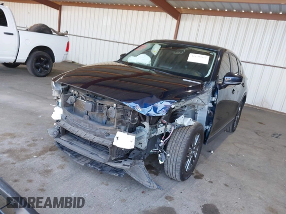 2020 Mazda CX-5 Touring z VIN JM3KFACM2L0802461, wystawiony jako IAAI lot #42148039 z przebiegiem 57 963 mil mil oraz . Historia ofert i sprzedaży dostępna na DreamBid. Obrazek 18.