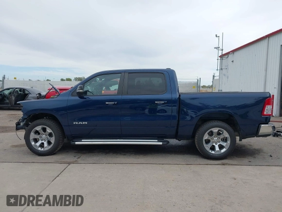 2019 Ram 1500 Big Horn/Lone Star with VIN 1C6SRFFT7KN663677, listed as a IAAI auction lot 40325088 with 77,035 mi miles. Bid and sale history available at carsss.com. Image 15.