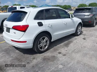 2014 Audi Q5 Premium Plus with VIN WA1LFAFP9EA124785, listed as a IAAI auction lot 42511649 with 99,109 mi miles and . Bid and sale history available at DreamBid. Image 4.