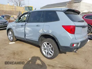2024 Honda Passport EX-L with VIN 5FNYF8H54RB015972, listed as a IAAI auction lot 41904138 with 9,638 mi miles and . Bid and sale history available at DreamBid. Image 3.