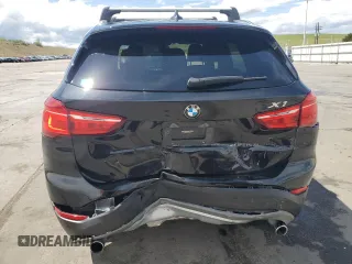2017 BMW X1 xDrive28i with VIN WBXHT3Z38H4A58005, listed as a Copart auction lot 55837805 with 50,318 mi miles and Salvage title. Bid and sale history available at DreamBid. Image 6.