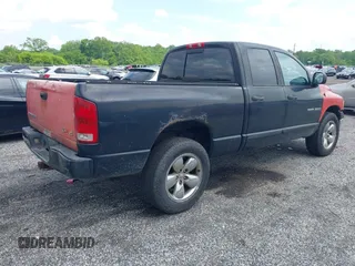 2004 Dodge 1500 SLT z VIN 1D7HU18D04J138633, wystawiony jako IAAI lot #42344088 z przebiegiem 203 875 mil mil oraz . Historia ofert i sprzedaży dostępna na DreamBid. Obrazek 4.