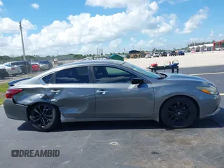 2017 Nissan Altima S with VIN 1N4AL3AP0HC297523, listed as a IAAI auction lot 42525818 with 162,767 mi miles and . Bid and sale history available at DreamBid. Image 12.