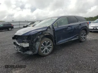 2018 Lexus RX 450hL Premium with VIN JTJDGKCAXJ2004699, listed as a Copart auction lot 63673635 with 6,850 mi miles and Salvage title. Bid and sale history available at DreamBid. Image 1.