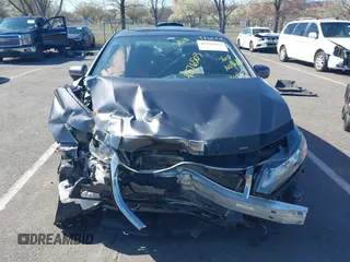 2015 Honda Civic Sedan Si with VIN 2HGFB6E50FH703745, listed as a IAAI auction lot 41910964 with 121,107 mi miles. Bid and sale history available at carsss.com. Image 12.