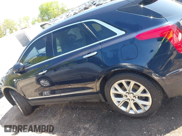 2017 Cadillac XT5 Luxury FWD with VIN 1GYKNBRS4HZ202853, listed as a IAAI auction lot 41977256 with 82,966 mi miles. Bid and sale history available at carsss.com. Image 14.