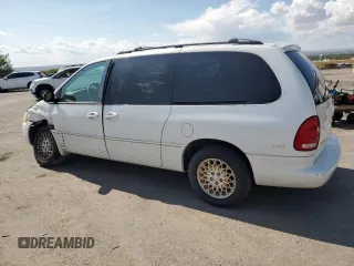 1998 Chrysler Town & Country LXi with VIN 1C4GP64L2WB637437, listed as a Copart auction lot 70504424 with 82,972 mi miles and Salvage Title. Bid and sale history available at carsss.com. Image 2.