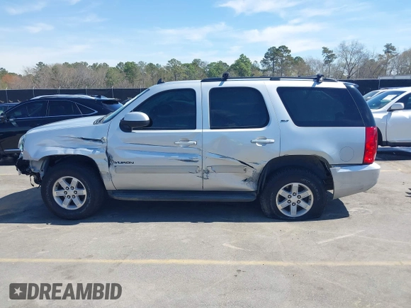 2014 GMC Yukon SLT with VIN 1GKS1CE04ER121301, listed as a IAAI auction lot 41825056 with 141,562 mi miles. Bid and sale history available at carsss.com. Image 15.