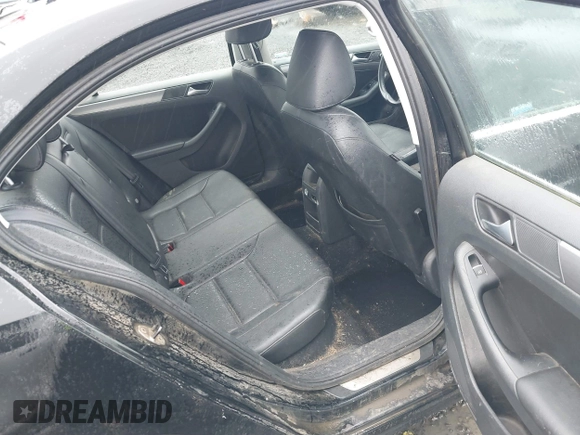 2014 Volkswagen Jetta TDI w/Premium with VIN 3VWLL7AJ1EM406360, listed as a IAAI auction lot 41857580 with 93,333 mi miles and . Bid and sale history available at DreamBid. Image 8.