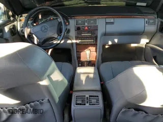 1996 Mercedes-Benz E Class with VIN WDBJF20F5TJ021801, listed as a Copart auction lot 80188074 with 196,397 mi miles and Salvage Title. Bid and sale history available at carsss.com. Image 8.
