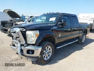2014 Ford Super Duty F-250 SRW XL with VIN 1FT7W2BT7EEB23580, listed as a IAAI auction lot 42009328 with 102,149 mi miles. Bid and sale history available at carsss.com. Image 2.