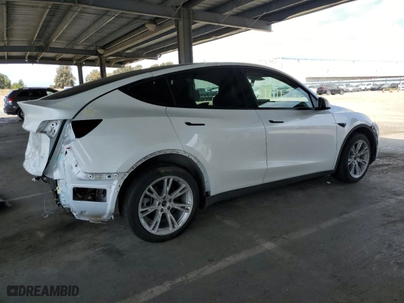 2022 Tesla Model Y Long Range with VIN 7SAYGDEE4NF493686, listed as a Copart auction lot 52544965 with 0 mi miles and Salvage Title. Bid and sale history available at carsss.com. Image 3.
